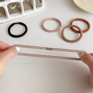 Elastic seamless hair ties set in neutral colors showing strong stretch performance