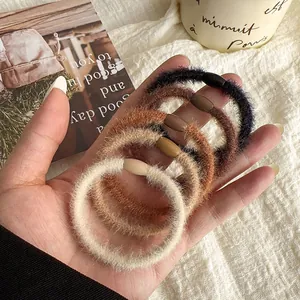 5-piece set of plush coffee-toned hair scrunchies in soft faux mink fur for women