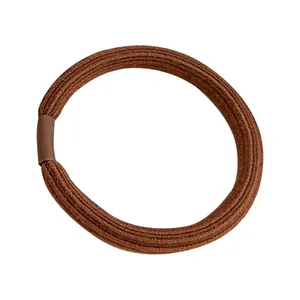 Thick milk tea brown elastic hair tie with ribbed texture and reinforced rubber joint