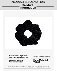 Detail view of a 9cm large black velvet scrunchie showing high elasticity and soft texture