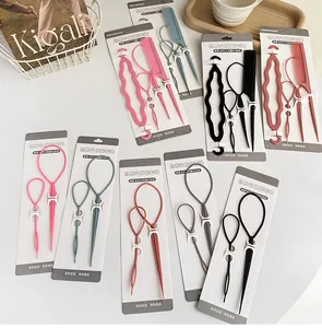 Detail of 4-piece hair styling set featuring pull hair needles and combs in various colors