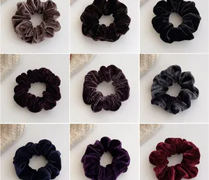Grid display showing nine colors of plush velvet oversized scrunchies for hair styling