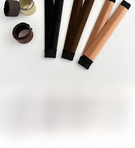 Detail showing various colors of hair bun makers with flexible synthetic hair texture