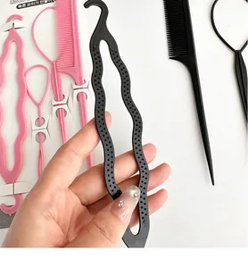 Detail view of multi-functional hair styling tools set including pull hair needles and combs