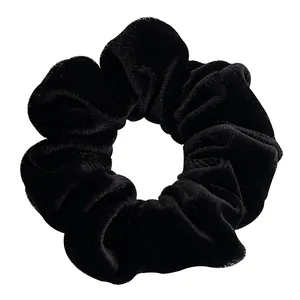 Large black velvet scrunchie with soft pleated texture for high ponytail styling