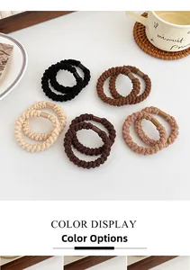 Dettaglio di elastici per capelli intrecciati ad alta elasticità in colori della terra