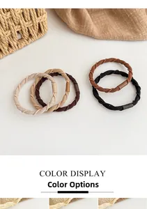 Detail of five durable high-elasticity hair ties in earth-toned neutral colors