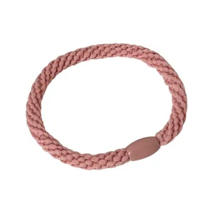 Pink braided elastic hair tie with smooth plastic connector on a white background
