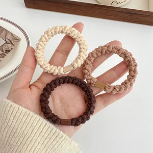 Set di tre elastici per capelli intrecciati durevoli in colori beige, caffè e marrone