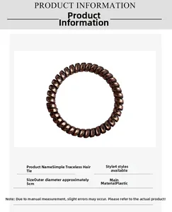 Macro shot of 5cm brown spiral hair tie with metallic finish and plastic texture