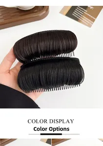 Detail view of invisible synthetic hair padding comb for increasing hair volume