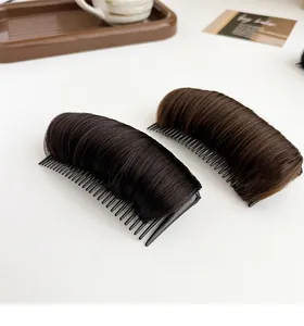 Detail of black and brown hair pads for root lifting and adding hair volume naturally