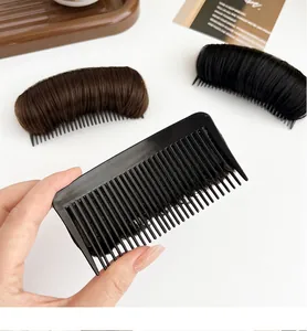 Macro detail of black and dark brown hair padding combs for invisible root volume boost