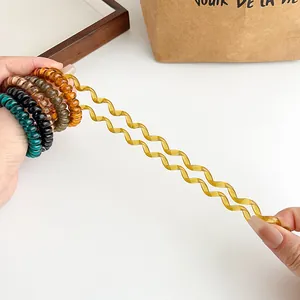 Elastic spiral telephone wire hair ties in jelly colors showing high stretch and durability
