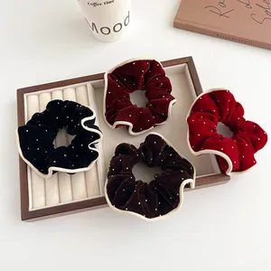Vintage velvet hair scrunchies with contrast piping and white dots in four elegant colors