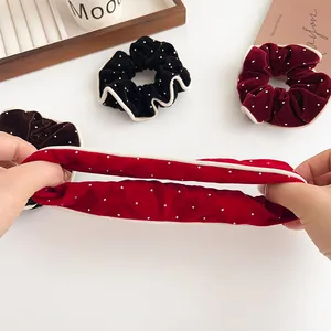 Vintage velvet scrunchies with faux pearl trim in wine red, black, and brown colors