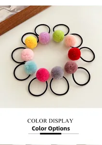 Detail of candy-colored plush ball hair ties set in 10 vibrant colors for girls