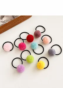 Set of ten colorful soft plush pom-pom hair ties with high elastic black rubber bands