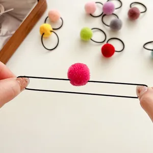 Colorful plush ball hair ties set with high elastic black bands for young girls