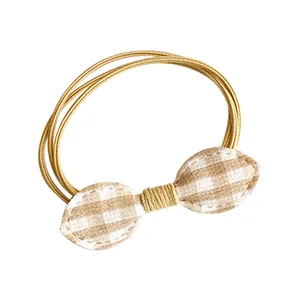 Three-in-one elastic hair tie featuring khaki gingham bow design in minimalist Korean style