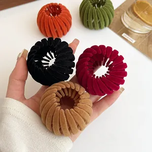 Velvet-covered bird nest hair clips in multiple colors for versatile hair styling