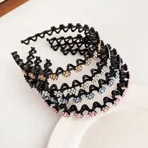 Golvende haarbanden met strass steentjes in roze, blauw en amber met antislip ontwerp set