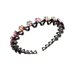 Zwarte golvende haarband met kleurrijke strasbloemen voor dames haarstyling