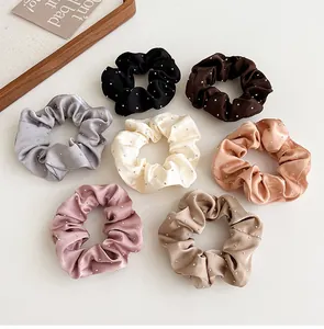 Set di sette elastici per capelli in raso con strass in vari colori Morandi