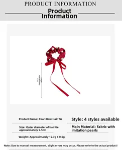 Detail view of red silk bow hair tie with pearls showing 21cm ribbon length and dimensions