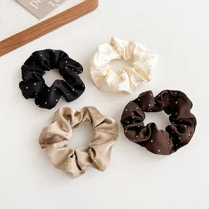Set di quattro elastici per capelli in raso con strass nei toni della terra