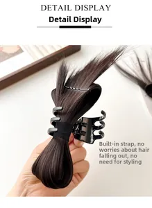 Detail view of dark brown claw clip hairpiece with secure internal binding strap