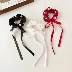 Elegant satin bow scrunchies with pearls in black, white and burgundy colors