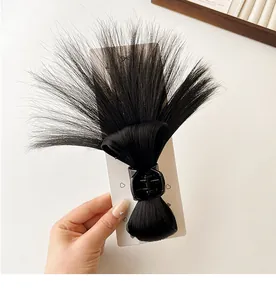 Detailed view of black synthetic hair claw clip wig for messy bun high ponytail hairstyle