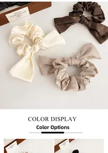 Détails des chouchous à nœuds élégants en satin crème, marron café et beige