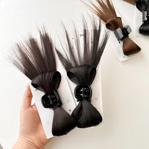 Messy bun hair claw clip extension in dark and light brown for voluminous ponytail looks