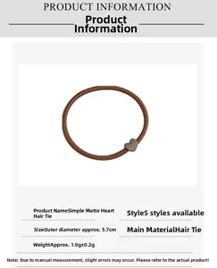 Detailed view of elastic hair tie with matte heart charm and 5.7cm diameter size info