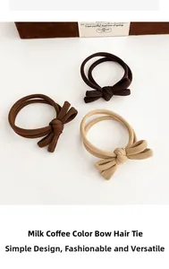 Close-up of three milk coffee colored bow hair ties in elastic textured fabric