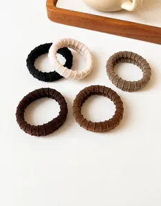 Color display of ribbed high elasticity hair ties in coffee and neutral shades