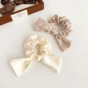 Chouchous nœud en satin rétro français en or champagne et soie blanc crème élégant