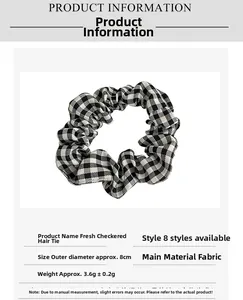 Detailed size specifications for a black and white checkered fabric scrunchie hair tie