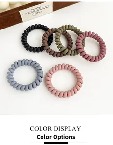 Détails des six chouchous spirales mats aux tons naturels et élastiques