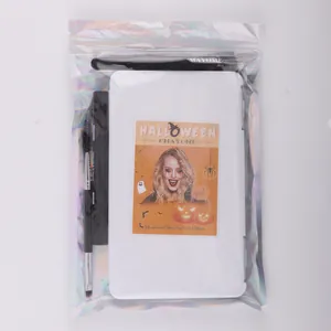 Detail of Halloween makeup kit featuring brushes and tray in a laser zip bag