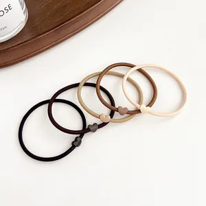 Five-piece set of minimalist high-elastic hair ties with matte heart charms in earth tones