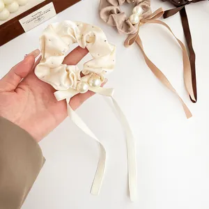 Elegant satin bow scrunchie with large pearls and rhinestones in warm cream and brown tones