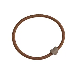 Elastic coffee heart hair tie with durable high-stretch band and matte resin heart charm