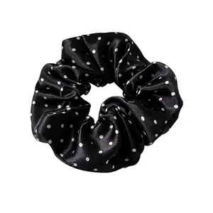 French style polka dot scrunchie made of silky black and white satin fabric