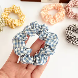 Set de coleteros a cuadros coloridos con textura de tela suave para peinados con estilo