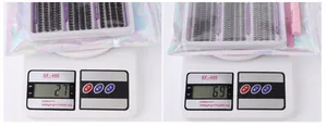DIY eyelash extension kit showing tray with multi-length lashes and packaging on a scale
