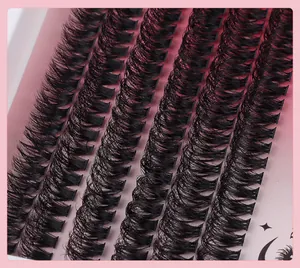 Nahaufnahme von 10-16 mm Büschelwimpern mit natürlichem Schwung auf rosa Hintergrund