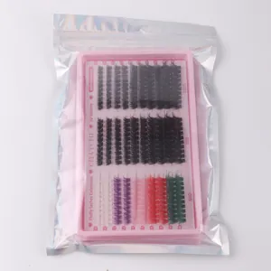Macro detail of mixed color and black individual lash extensions in pink tray packaging